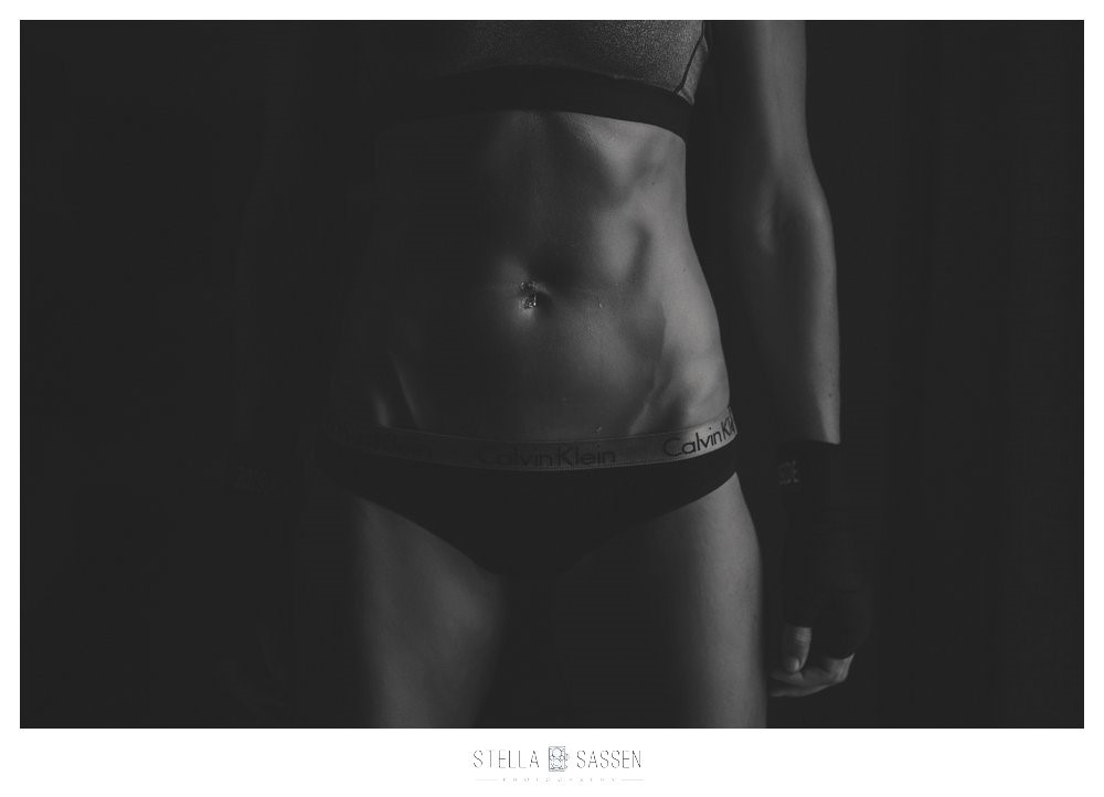 Fitness image of woman's abs and legs in black and white